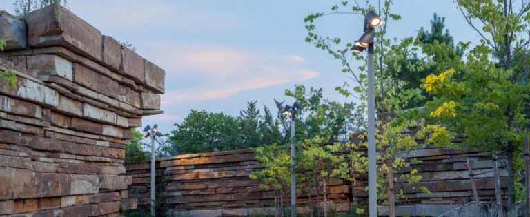 Lights in a court yard at dusk